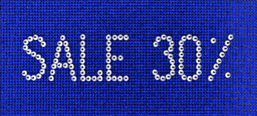 Wall Mural - Word SALE is made rhinestones crystal color on a blue canvas background.