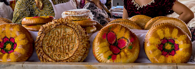 National festal uzbek bread sold in the market - Samarkand, Uzbekistan. There are two types of Uzbek bread: plain and festal one.