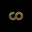 Initial lowercase letter co, linked outline rounded logo, elegant golden color on black background