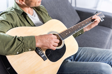 man playing guitar