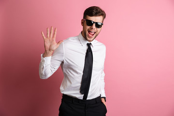 Sticker - Portrait of a cheerful excited man in white shirt