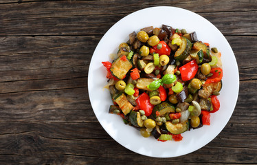 Poster - tasty Caponata with vegetables on plate