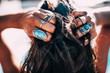 © Criene Images - Close up of Women with bohemian style jewellery rings on hands