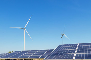 Wall Mural - solar cells and wind turbines generating electricity is solar energy and wind energy in hybrid power