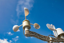 Sail Boat Anemometer On The Blue Sky Background. Yacht Equipment, Sailors World.