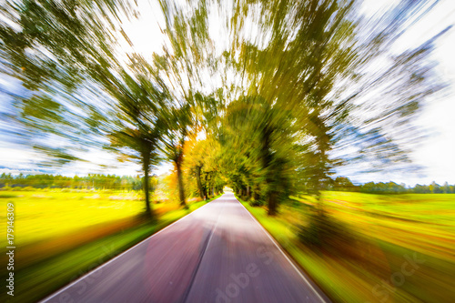 Cuadros en Lienzo A way in polish Masuria blurred by speed of the car