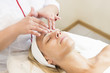 © lester120 - Massage and facial peels at the salon using cosmetics