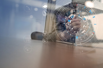 Poster - businessman hand working with modern laptop computer in modern office with virtual icon diagram