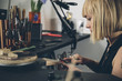 © Lior + Lone/Stocksy - Young attractive jewelry designer working on a piece in her workshop