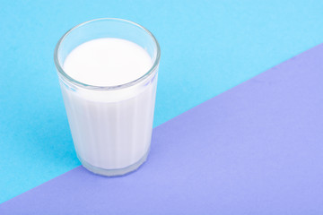 Canvas Print - Glass with milk on bright background