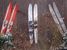 Three Sets Of Water Skis Standing Up In The Winter Cold
