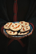 Halloween Pumpkin Shaped Cookies In Vintage Dish