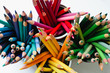 © Jess Lewis/Stocksy - bright colored pencils in containers