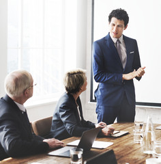 Wall Mural - Business people in a meeting room