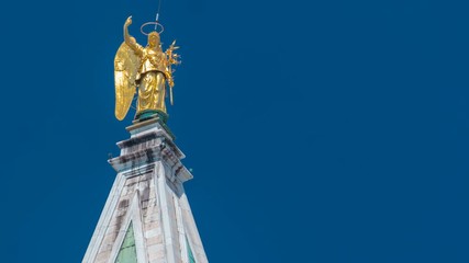 Wall Mural - The famous 16th century square cathedral tower on San Marco square timelapse.