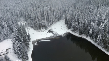 Wall Mural - aerial view of a mountain lake in winter