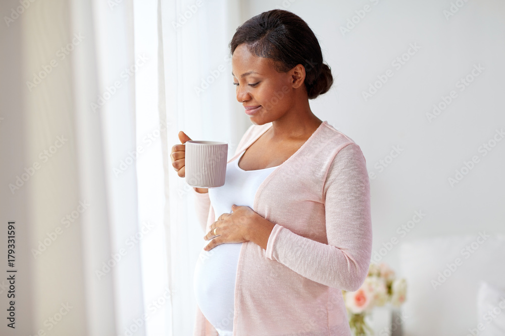 happy pregnant woman with cup drinking tea at home Stock Photo | Adobe ...