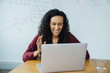 © FS Productions/Blend Images - Mixed race businesswoman on video conference