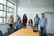 © FS Productions/Blend Images - Portrait of diverse business people in conference room