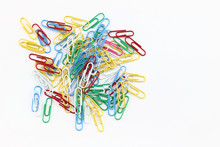 Colorful Paper Clips In A White Background
