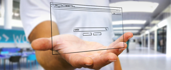 Wall Mural - businessman holding and touching a website page sketch