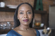© HEX - Portrait of businesswoman at home