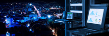 Management And Monitoring Monitor In Data Center And Connectivity Lines Over Night City Background, Smart City Concept