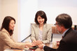 © Takako - business meeting