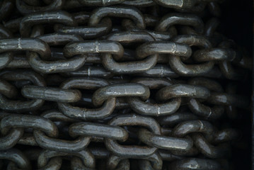 anchor chain on a roll. this piece of chain makes an interesting texture when rolled up on the bow o