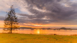 Fototapeta Sawanna - Sunrise and Clouds - Waterscape over the Bay
