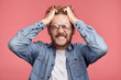 © WHstudio Leushin N - Mad crazy man regrets awful mistake, clenches teeth with annoyance, understands that he can`t change anything or return time back to improve situation, being in big panic and stress. Great desperation