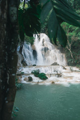 Wall Mural - Kuang Si Falls Waterfall Viewed from Under a Tree