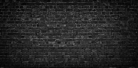 Wall Mural - dark brick wall as a backdrop. brickwork design element