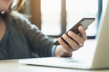 Poster - woman use phone on desk in office place