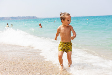 Beautiful boy and the sea