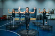 © Nomad_Soul - Women group doing fit exercise on sport trampoline