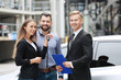 © Africa Studio - Young couple with car dealer outdoors