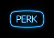 Perk  - colorful Neon Sign on brickwall
