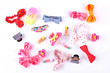 Beautiful collection of kids hair accessories. Set of different fashion hairpins and scrunchies for childrens on white background. Childrens stylish hairpins for hairdo.