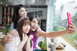 © ryanking999 - happy woman friends in restaurant