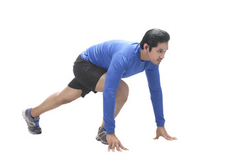 Poster - Portrait of asian sportsman in ready position to run