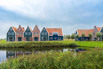 Wall Mural - Volendam is a town in North Holland in the Netherlands. Colored houses of marine park in Volendam. North Holland, Netherlands..