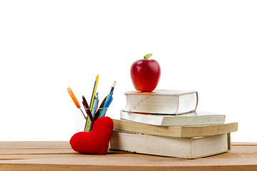 Love study and school concept with book on wooden background and heart