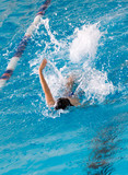Fototapeta Łazienka - boy on a swim in a sports pool