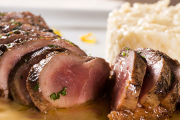 Duck magret with tucupi sauce and jambu risotto.