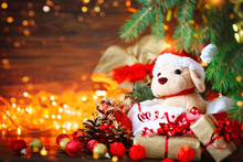 Christmas Decoration, Holiday Plush Dog With Gifts Under The Christmas Tree. With New Year And Christmas.