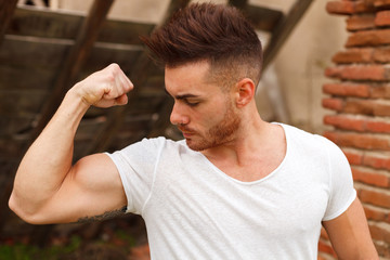 Wall Mural - Strong guy in al old house