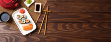 Set Of Sushi With Red Teapot And Chopsticks