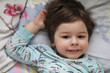 © alexkich - Portrait of a young child lying on a pillow