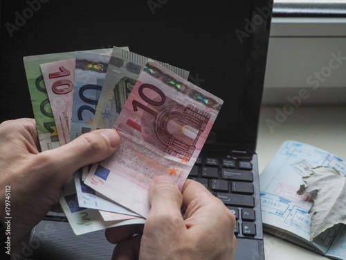 A Man Counts Euro Before Purchase In The Online This A Man Counts Euro Before Purchase In The Online